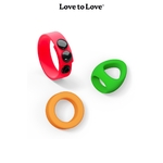 3 anneaux de penis avec 3 formes et couleurs differentes, un rouge, un vert et un orange