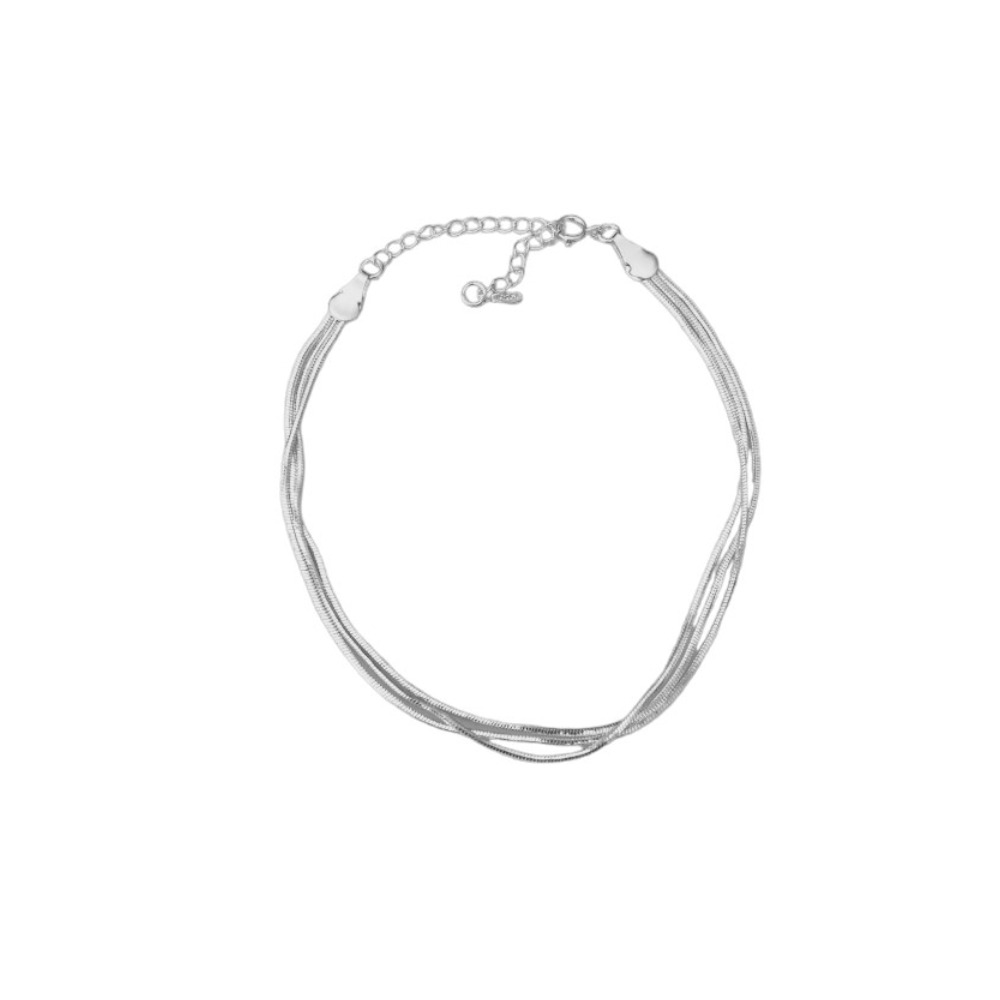 chaine cheville argent femme avec trois rangs exposee fond blanc laurine