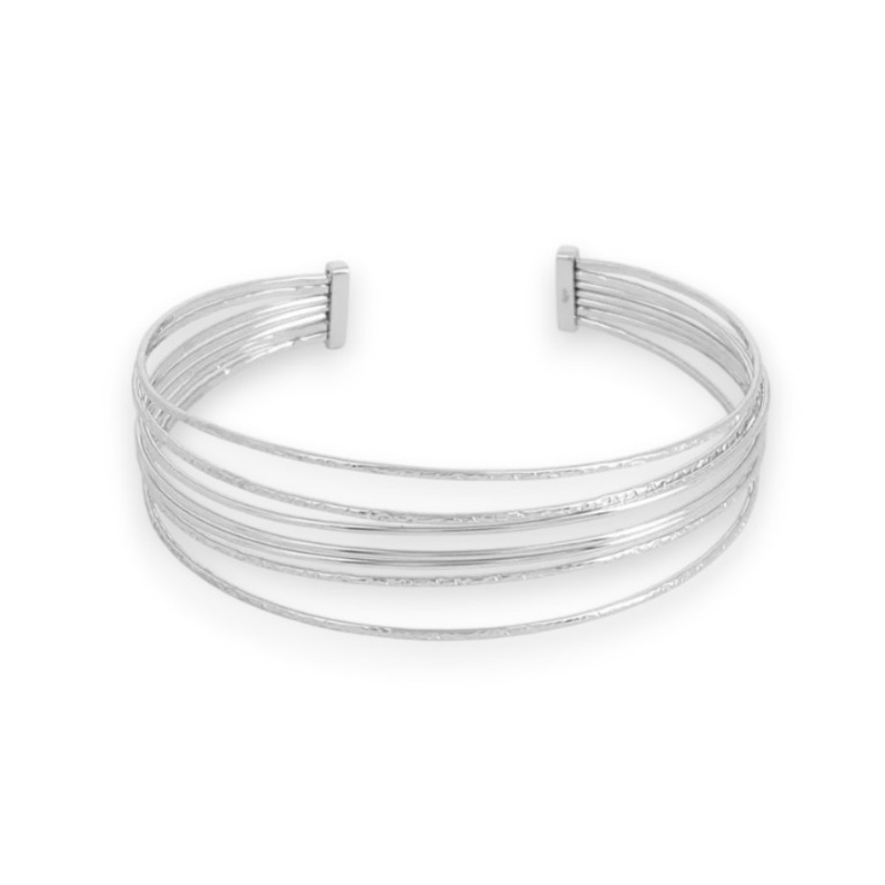 jonc semainier ouvert en acier inoxydable avec anneaux lisses et stries expose sur fond blanc laure