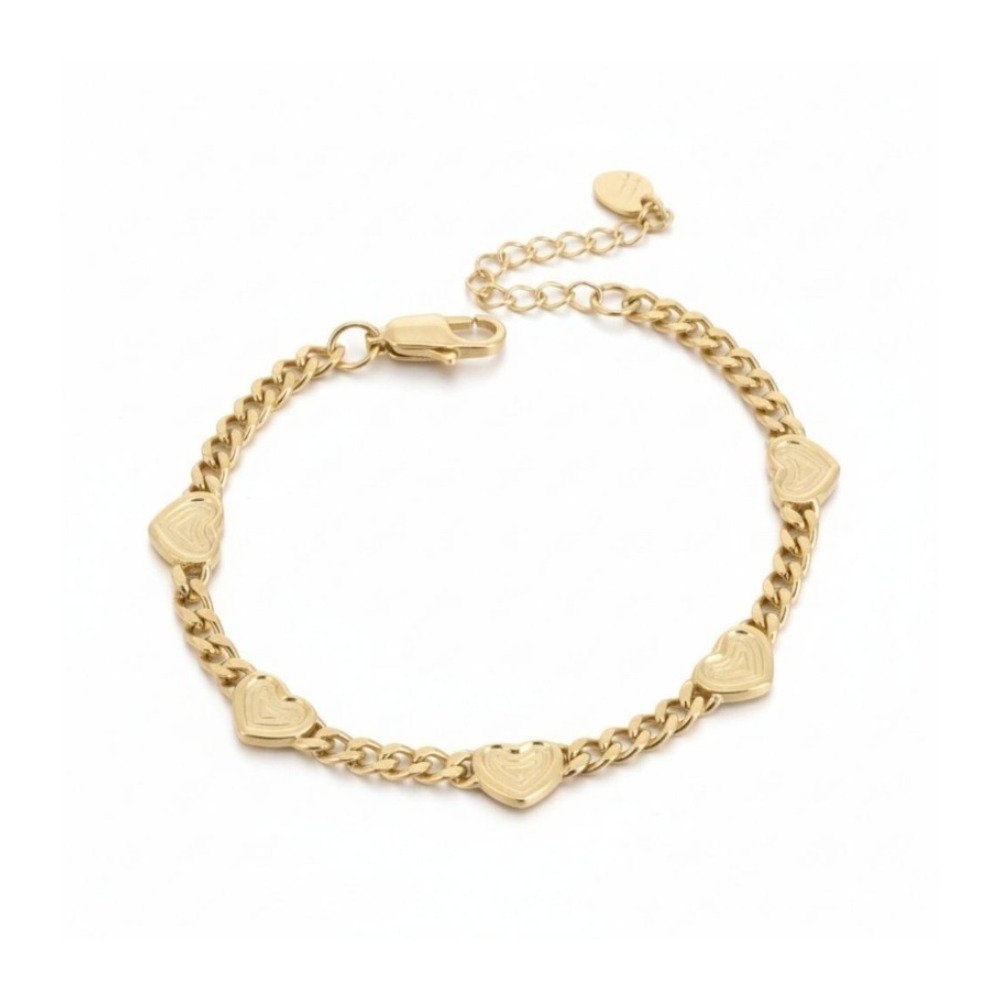 bracelet gourmette coeurs dores cora avec motifs textures expose sur fond blanc