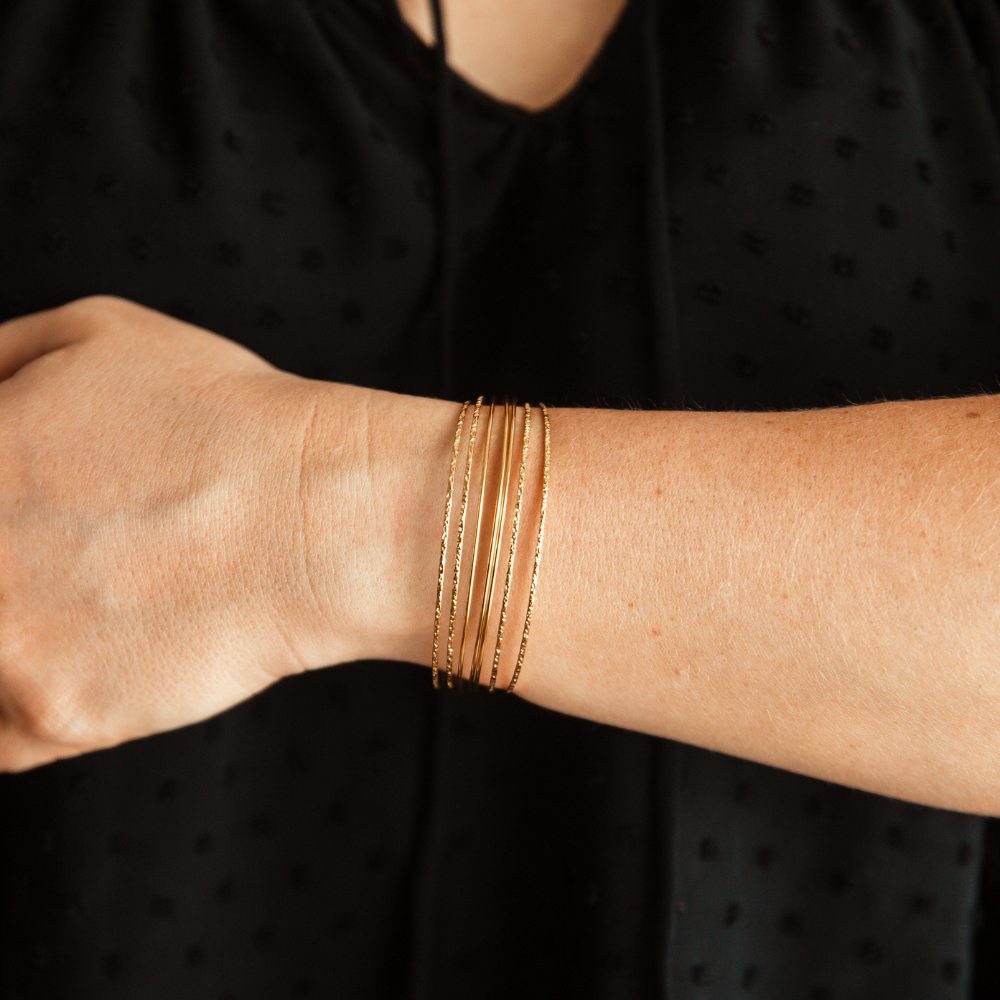 bracelet semainier doré Aliénor porté au poignet