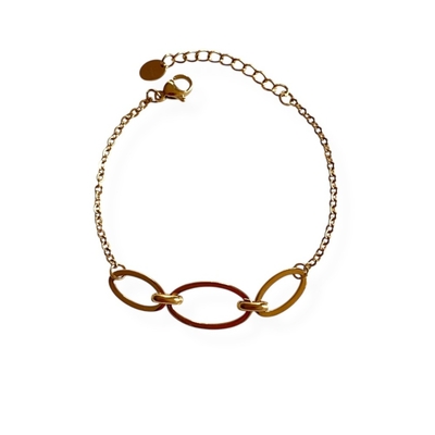 bracelet maillon acier dore anneaux ovales et polis expose fond blanc philippine