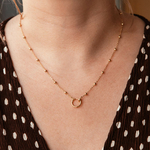collier pour charms acier inoxydable dore avec chaine fine a petites boules et anneau fermoir pratique porte bianca