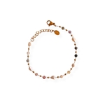 bracelet perles fines tourmaline perles naturelles et acier dore expose sur fond blanc milie