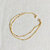 bracelet multirang dore pose fond blanc celia