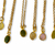 collier tourmaline avec chaine en acier inoxydable et pierre aux tons multiples expose fond blanc lisea