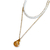 collier coquillage deux rangs avec une chaine classique avec pendentif et une rangee composee de perles blanches expose fond blanc stella