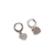 boucles d oreilles coeur argentees petites creoles et pendentif martele en forme de coeur exposees fond blanc victorine