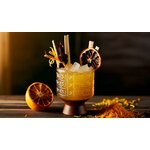 Cocktail premium aux notes de safran et dépices.