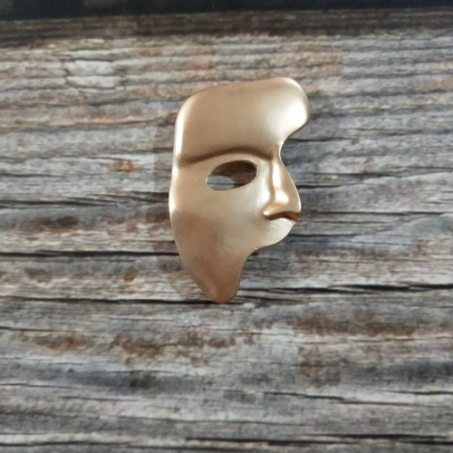 broche dorée masque original cadeau anniversaire origjnal mode