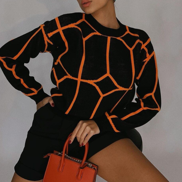 pull chic noir orange imprimé femme la selection parisienne