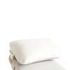 Oreiller Wobbel Original Quartz posé sur le matelas assorti