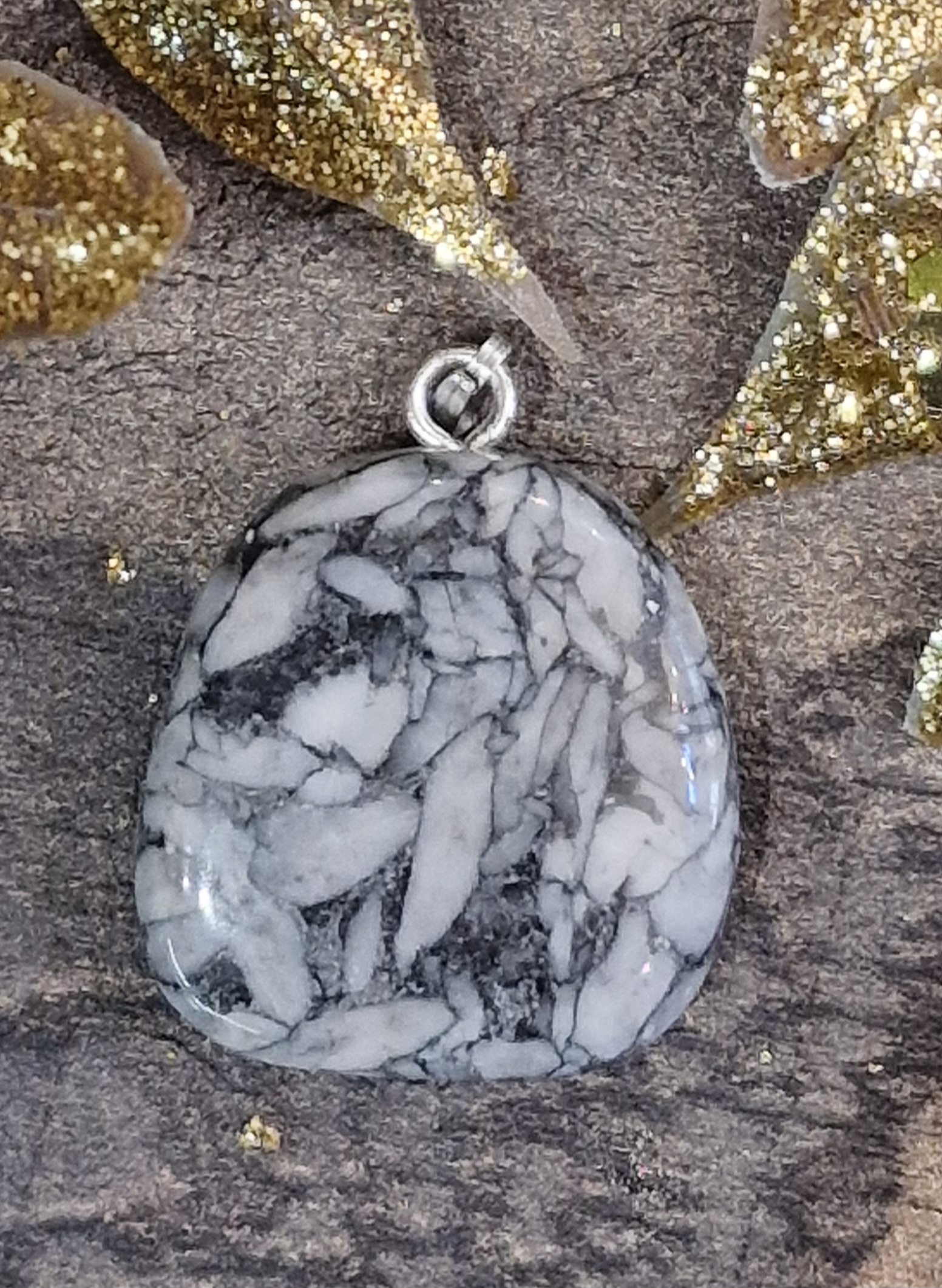 Pendentif pinolite