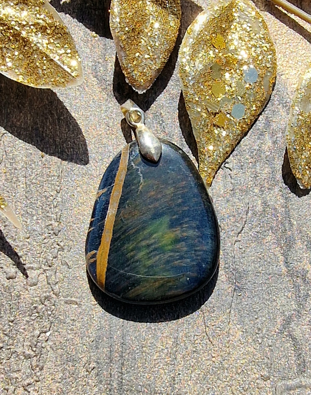 Pendentif oeil de faucon