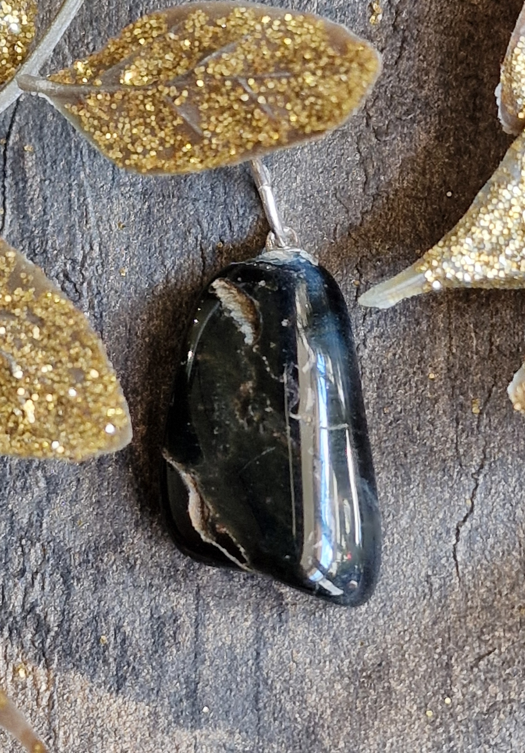 Pendentif oeil de faucon