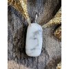pendentifpierrerouleehowlite