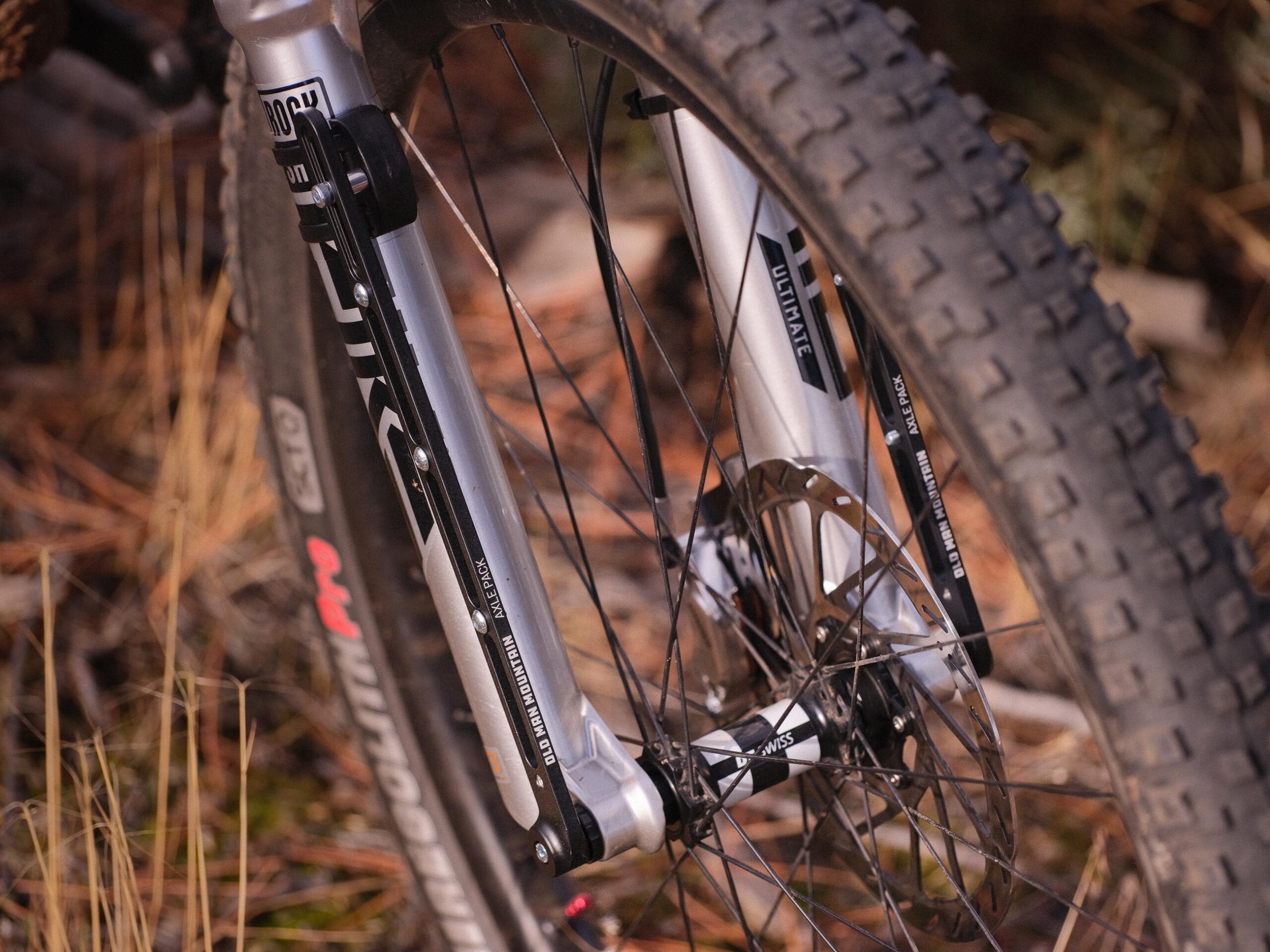 Adaptateur fourche sur axe traversant
