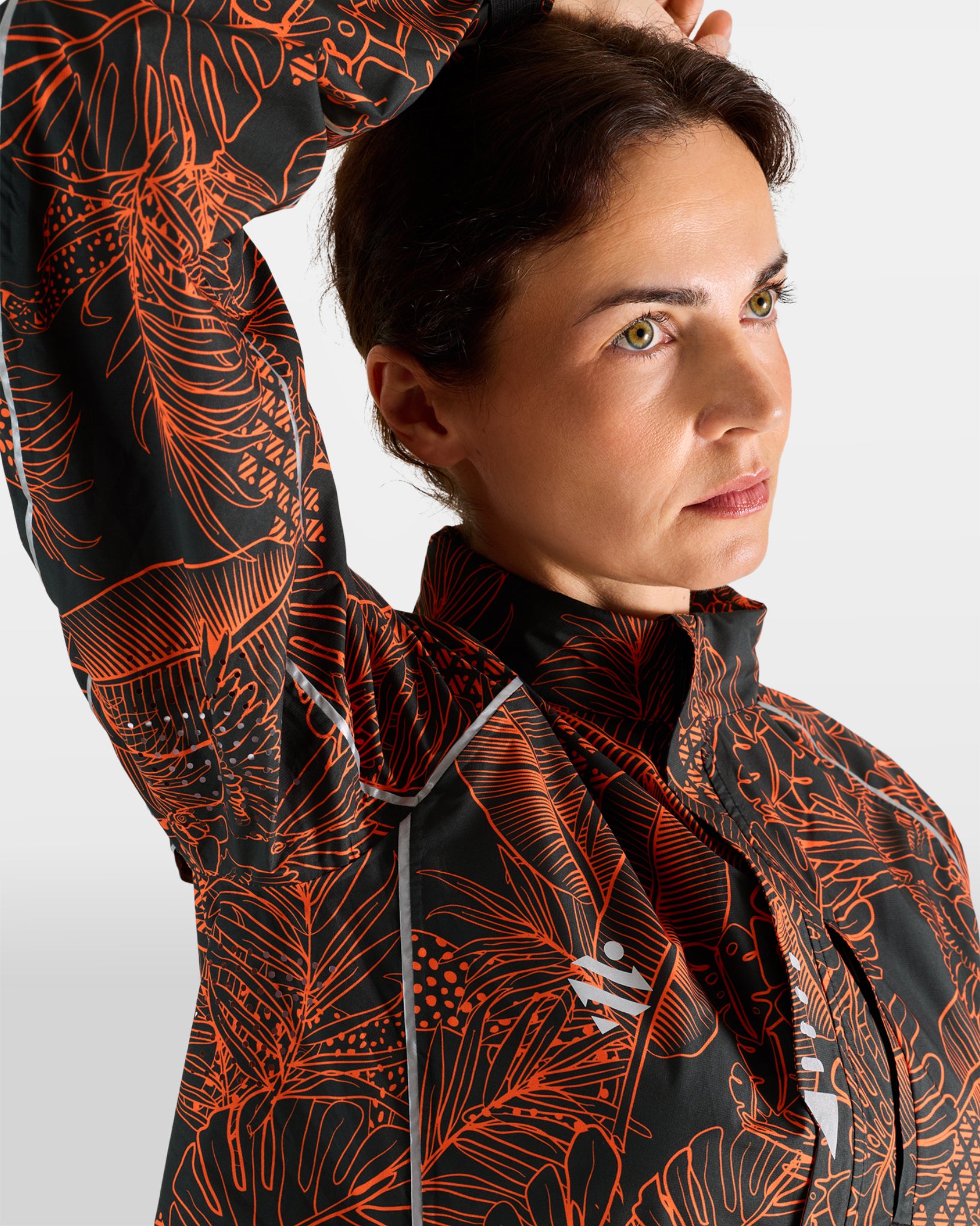 veste-sport-outdoor-ultra-legere-respirante-escapade-motif-jungle-orange-femme