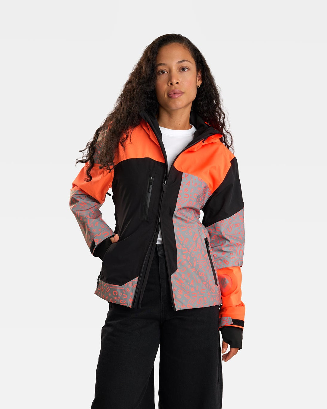 repop-orange-fluo-noire-motif-graffiti-veste-velotaf-impermeable-femme
