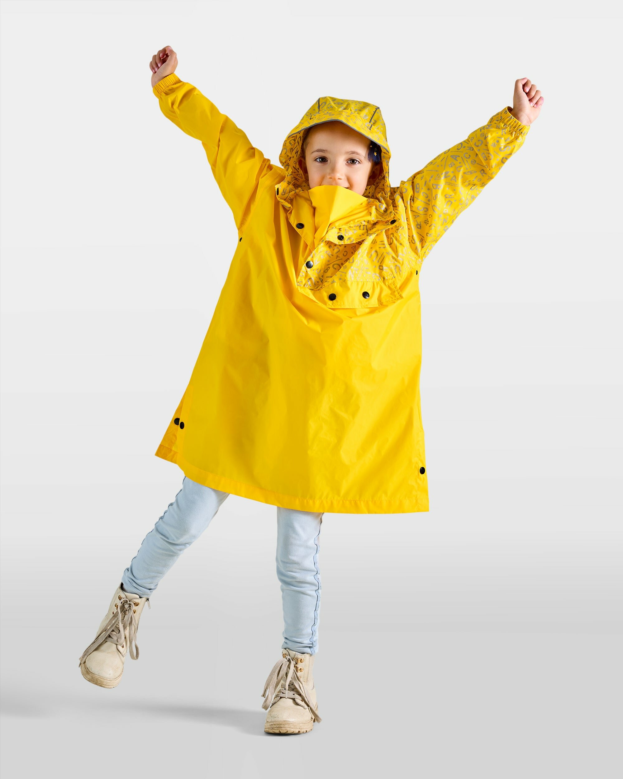 petit-poncho-de-pluie-velo-jaune-motifs-graffiti-reflechissants-fille-enfant-ample
