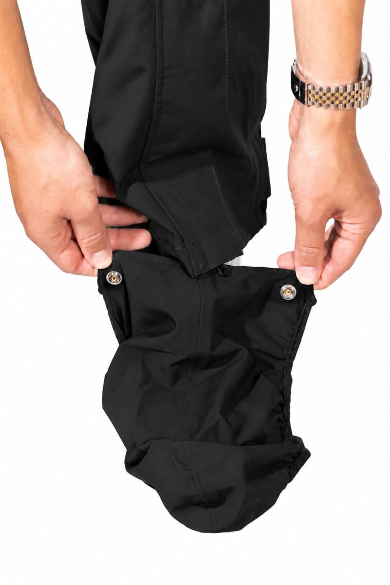 Pantalon pluie vélo Hello Rain Storm 20K noir porté