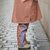 Pantalon de pluie coloré enfant Poule Party Sunrise porté