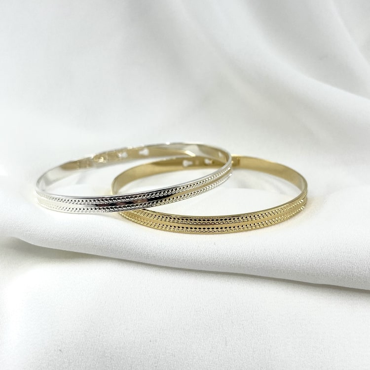 Jonc MATTEO: jonc fermé et joliment décoré de deux fines bandes perlées. Existe en plaqué or 3 microns et en argent 925