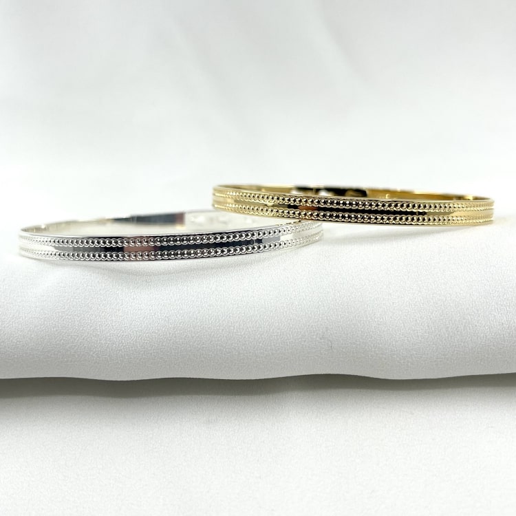 Jonc MATTEO: jonc fermé et joliment décoré de deux fines bandes perlées. Existe en plaqué or 3 microns et en argent 925