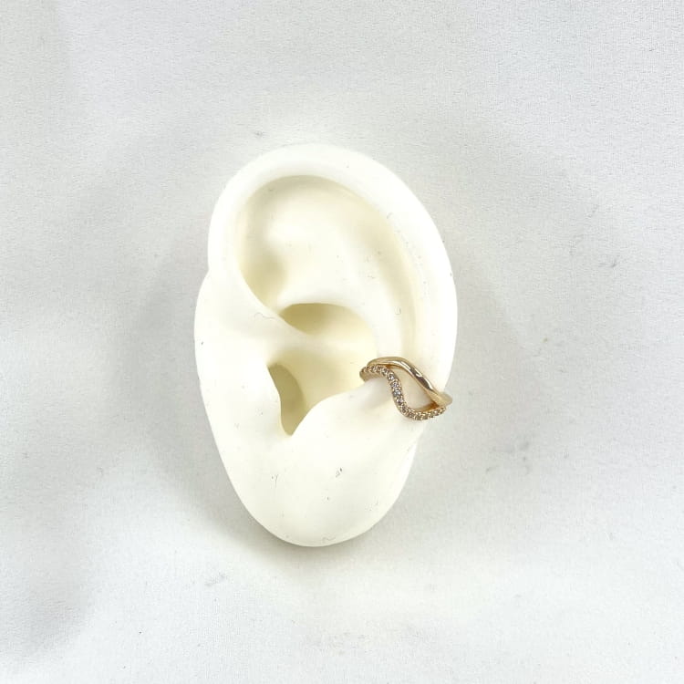 Bague oreille Elodie: Bague doreille double rangs, un lisse lautre serti doxydes de zirconiums blancs. En plaqué or 3 microns