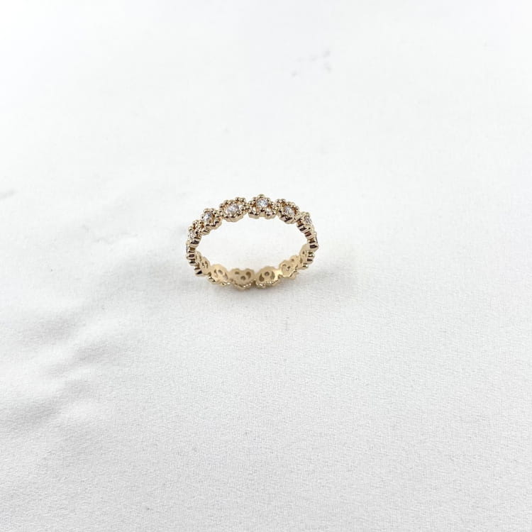 Bague Orly : Bague composée de petits coeurs alternés sertis de zirconiums blancs. En plaqué or 3 microns 18 carats