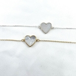 Bracelet Romeo : Bracelet orné d'un joli cœur en nacre. En plaqué or 3 microns et en argent 925.