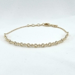 Soan: bracelet semi rigide et martelé aux motifs géométriques. En plaqué or 3 microns
