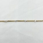 Ambroise: bracelet en maille gourmette incrustée de huit petits oxydes de zirconium blancs. En plaqué or 3 microns