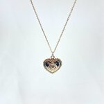 Nathan: collier composé dune chaine fine et dun pendentif coeur doté dun petit oeil en relief en son centre. En plaqué or 3 microns