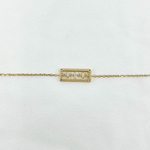 Bracelet Yvan: bracelet doté dun joli rectangle perlé incrusté doxydes de zirconiums blancs. En plaqué or 3 microns