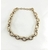 Bracelet Lindsay Bracelet composé de mailles ovales striées et de maillons ronds et lisses. En plaqué or 3 microns