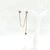Estelle-Boucle d'oreille double trous composée de puces en forme d’étoiles reliées entre elles par une fine chainette. En plaqué or 3 microns