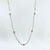 Theo:Collier composé d'une chaine fine et de perles d'eau douce, en plaqué or 3 microns.