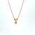 collier Jeff: Collier composé d'une chaine fine et d'un pendentif en forme de goutte serti d'un oxyde de zirconium. En plaqué or 3 microns.