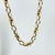 Collier Antoine: collier épais en maille ronde agrémentée de jolis détails lisses et perlés. En plaqué or 3 microns 18 carats.