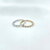 Bague Ysia : Bague composée de petits zirconiums rectangulaires blancs. En plaqué or 3 microns et en argent 925