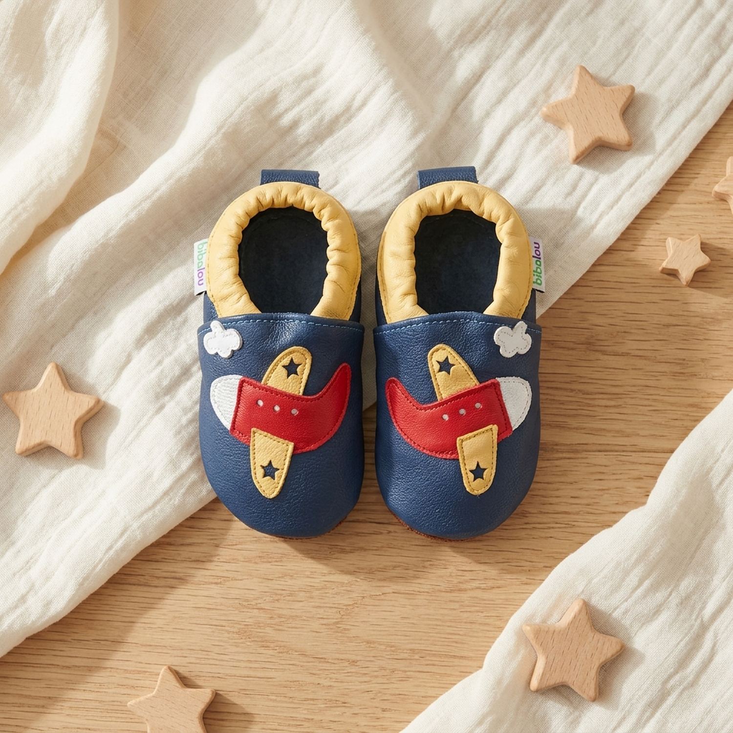 chaussons-bebe-cuir-souple-un-avion-a-reaction-vue-dessus-3