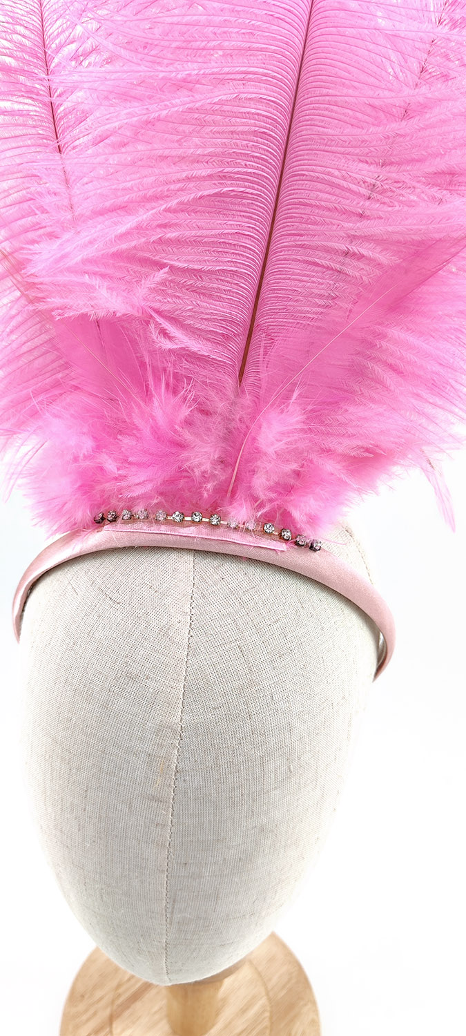serre tete plume autruche rose hot pink