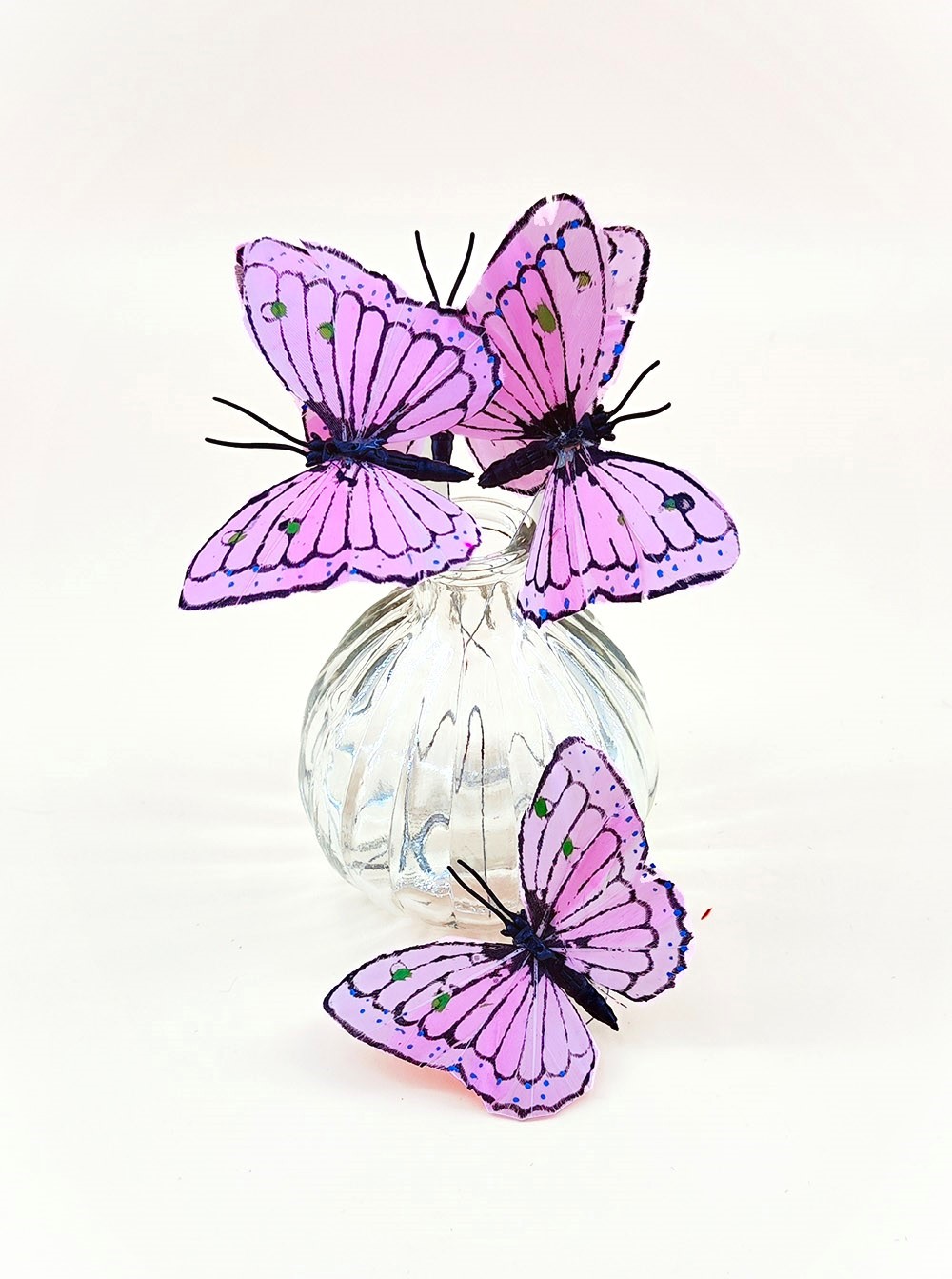 jolis papillons en plume rose