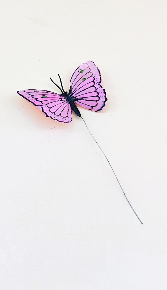 papillon en plume rose pour décoration