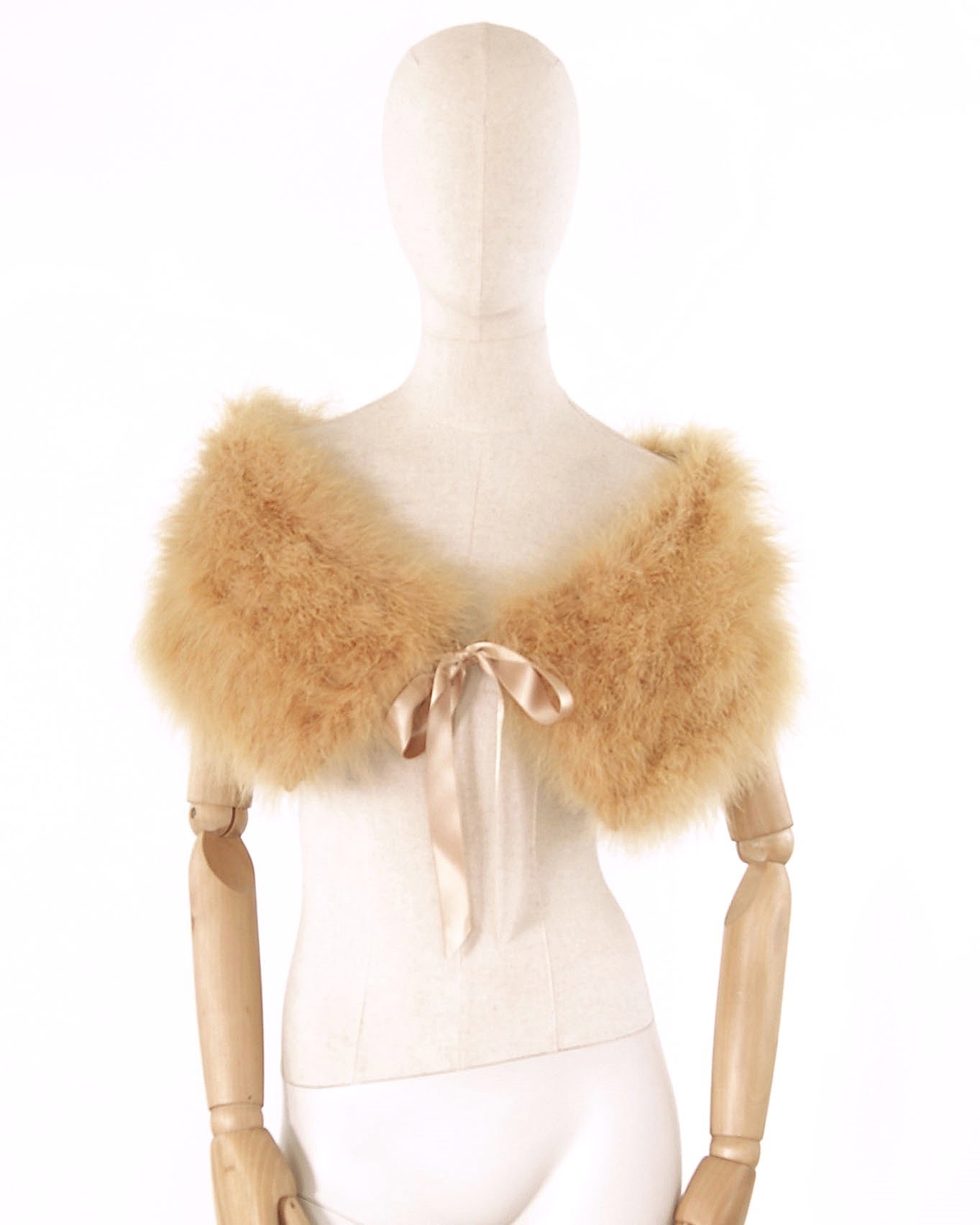 cache épaule plume beige