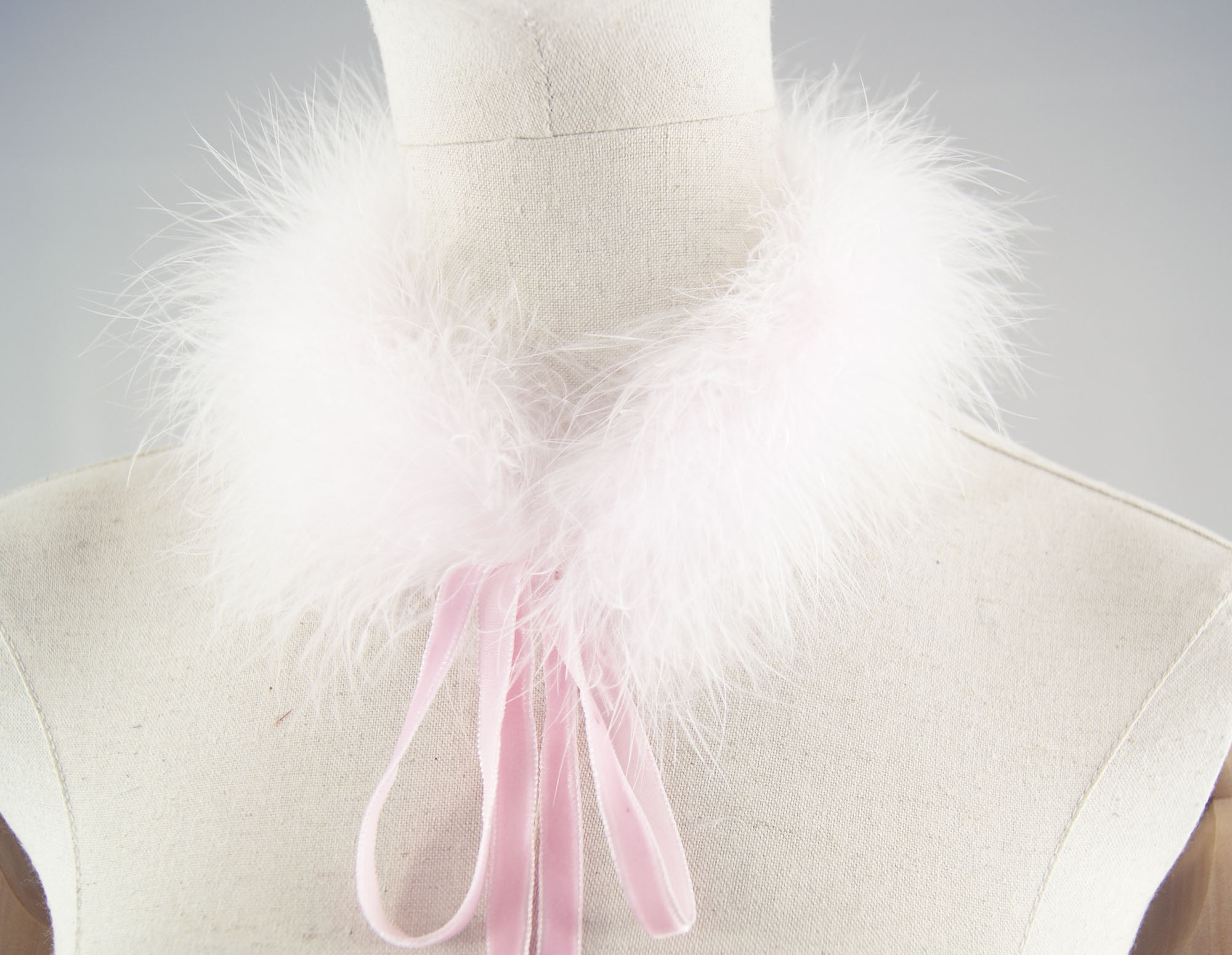 col duveteux rose pale