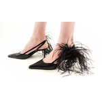 broche plume pompon noir