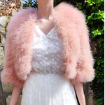 boléro plume rose de qualité