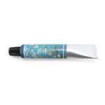 Stylo bille, tube de peinture, fleur damandier